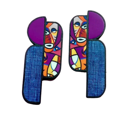 Pair of abstract earrings with colorful faces and blue.