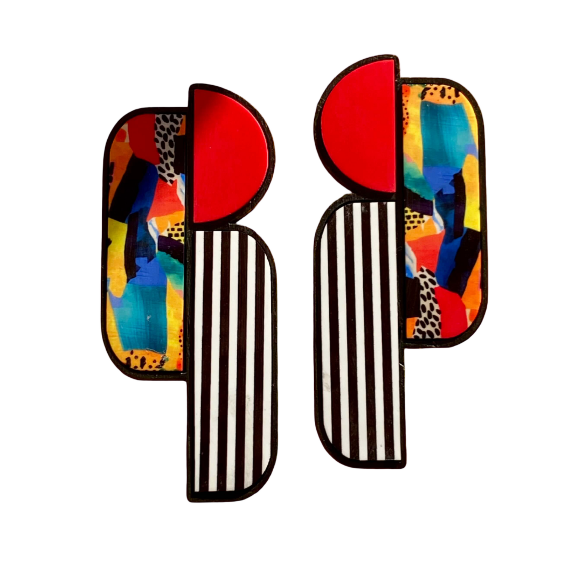 Colorful abstract earrings with geometric patterns.