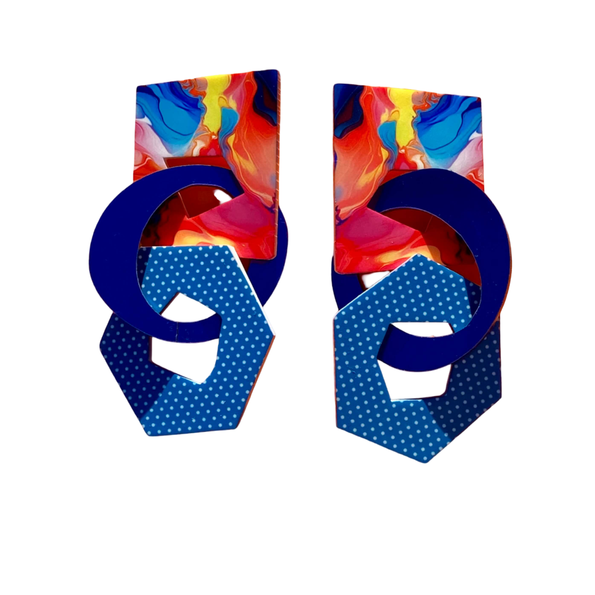 Colorful earrings with blue polka dot pattern.
