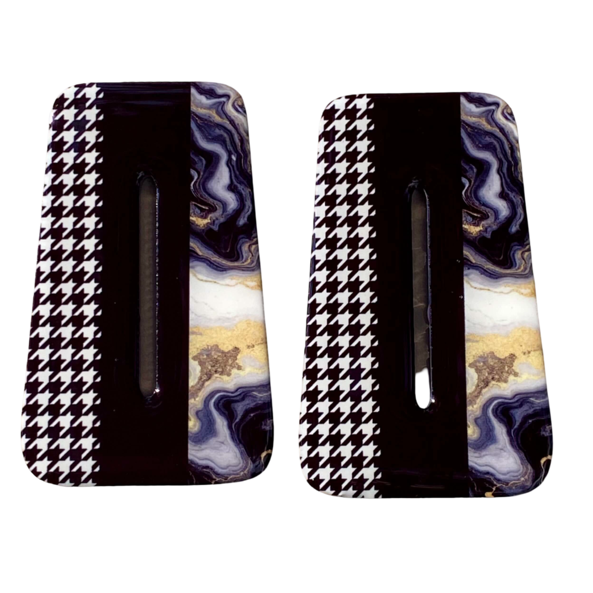 Pair of earrings with houndstooth and marbled design.