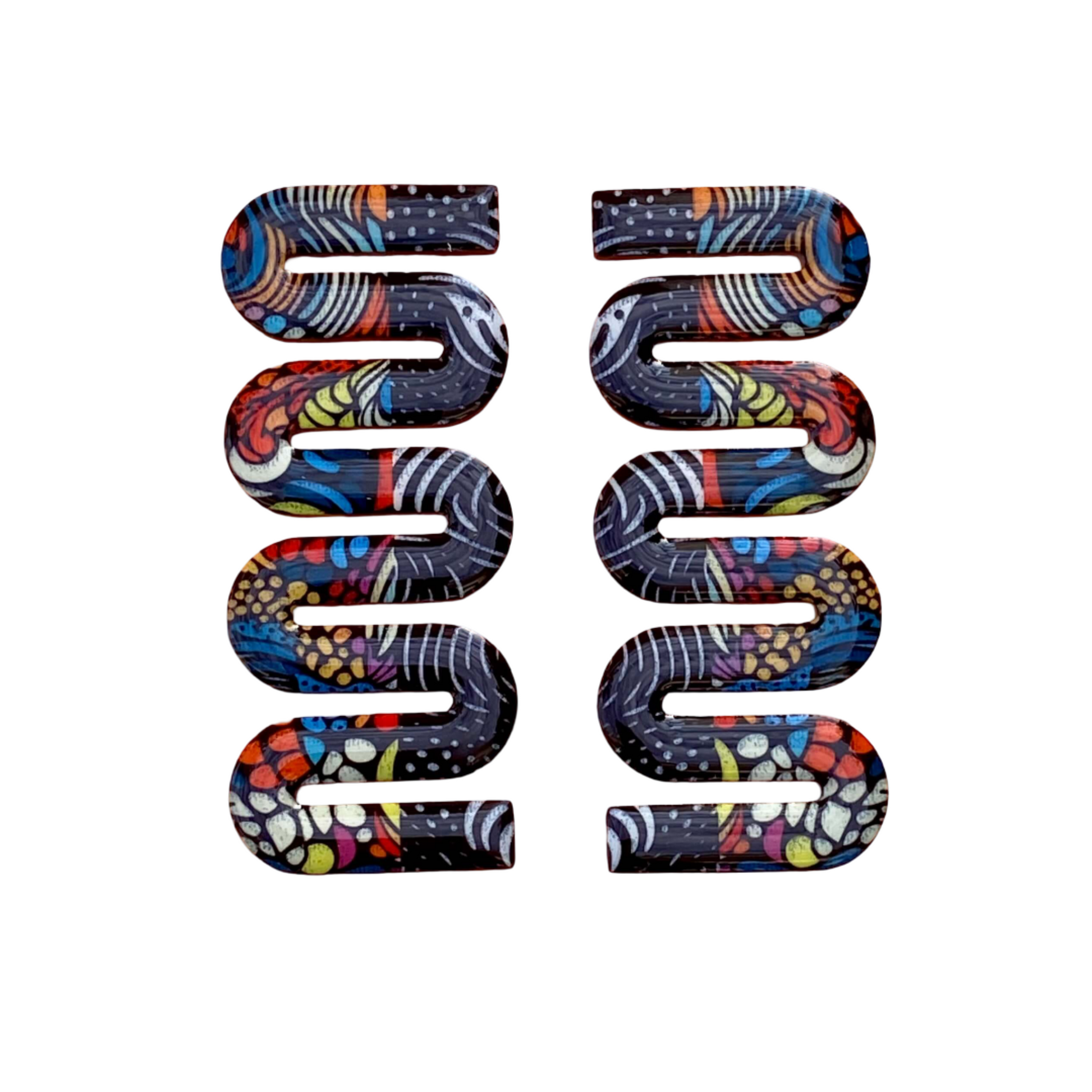 Maven acrylic earrings in mixed prints.