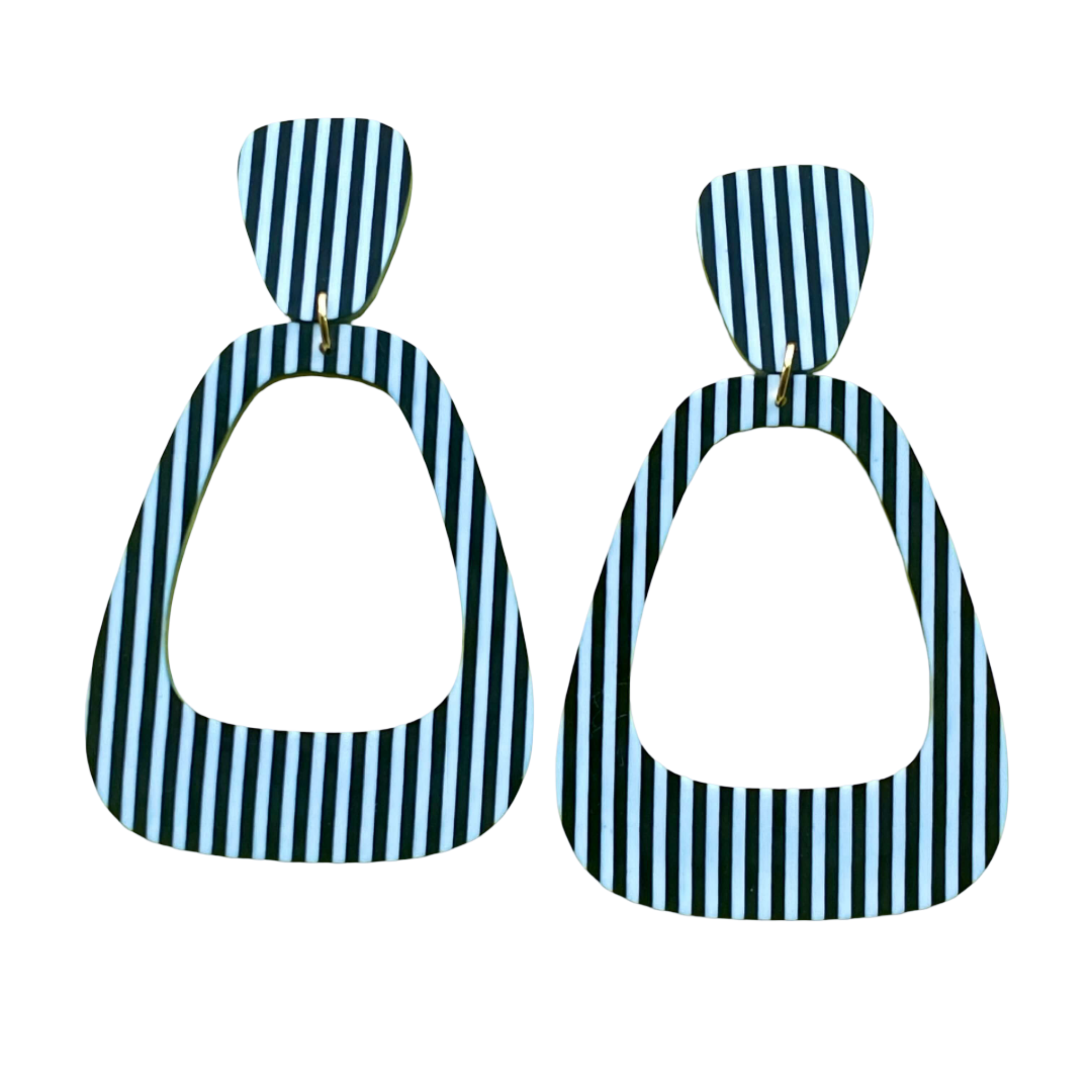 Pair of earrings with black and white striped design.